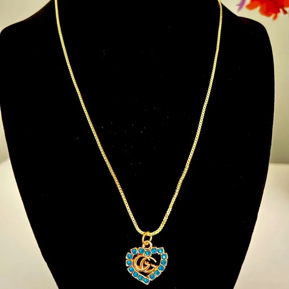 Authentic Gucci Gold and Turquoise Heart Charm with Necklace - Picture 3 of 6